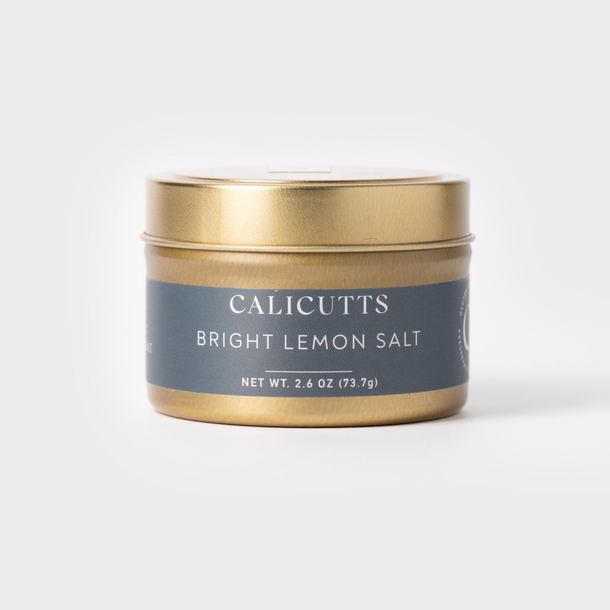 a gold container with a lid
