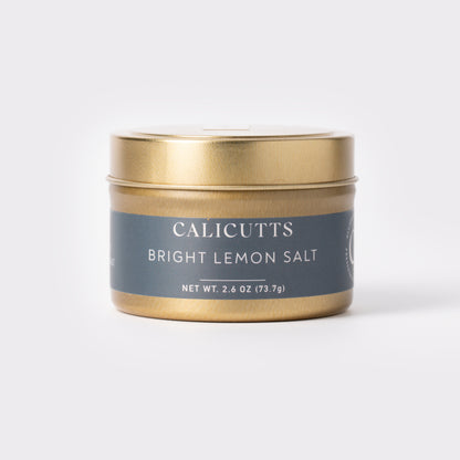 a gold container with a lid