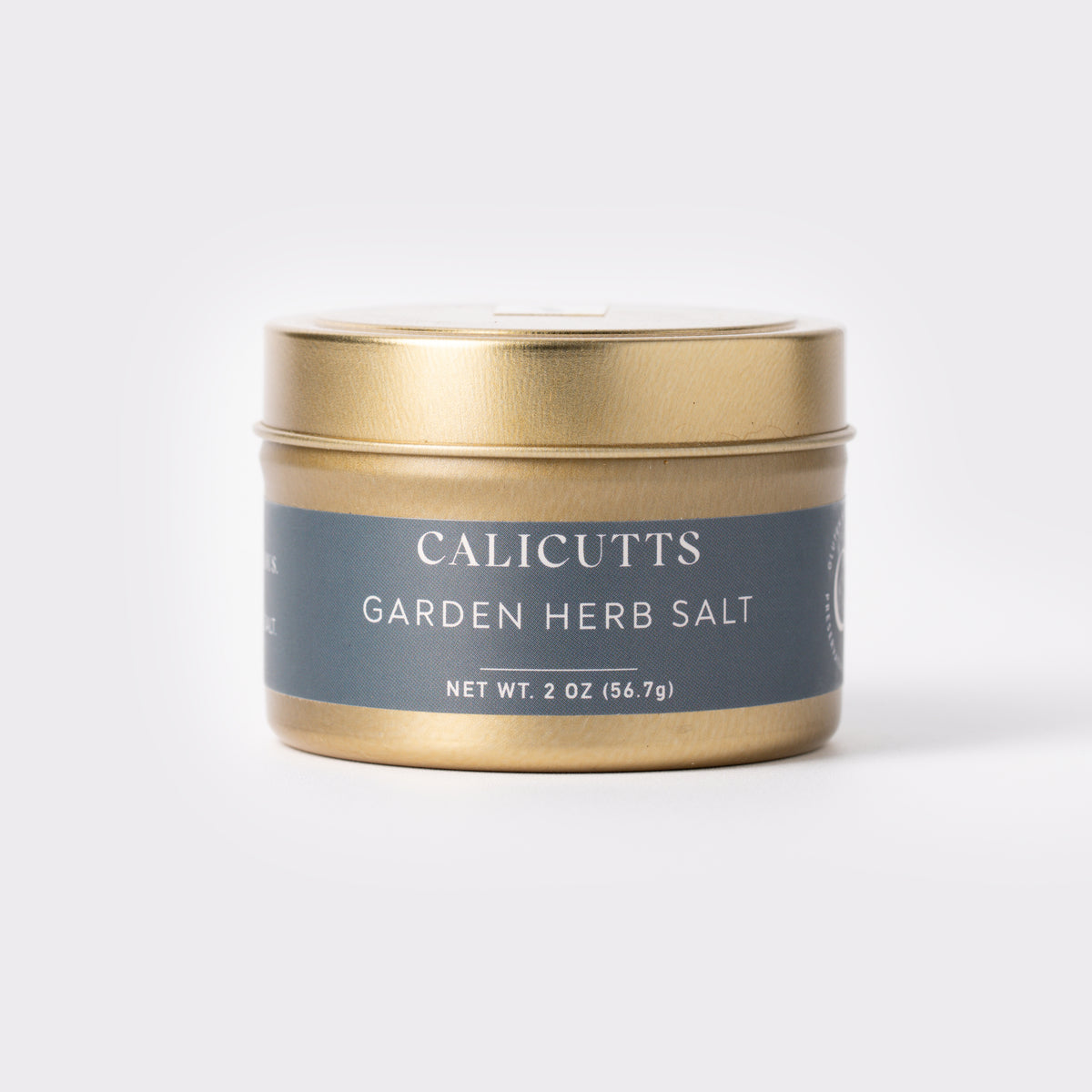 a gold container with a lid