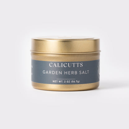 a gold container with a lid